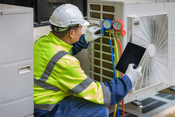 Professional Hvac technician working in Pembroke, VA